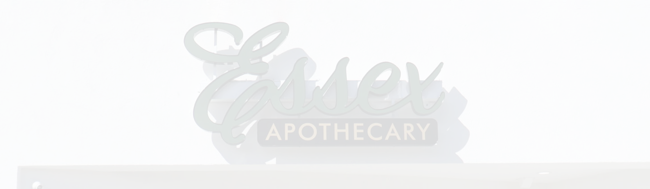 essex apothecary logo on a light background